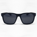 Black sunglasses with dark lenses on a white background